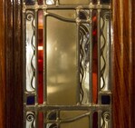 Detail glas in lood van de winkeldeur.
<br/>
Marcel Westhoff, januari 2016
